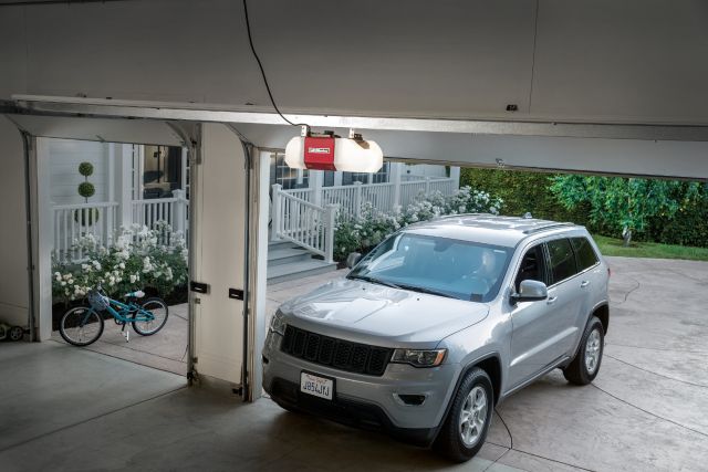 This is an image of an LED garage door opener in a garage.
