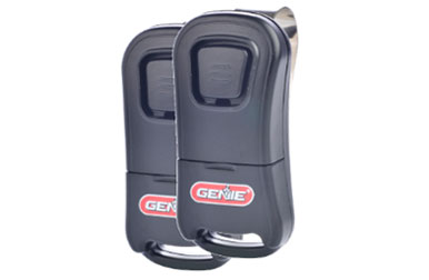 This is an image of a Genie garage door keychain remotes.