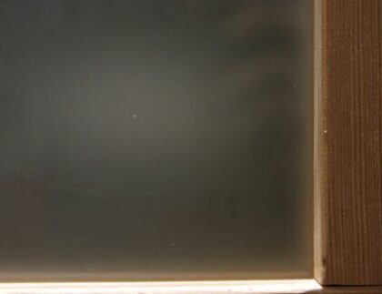 This is an image of a type of garage door window glass: frosted acid etch.