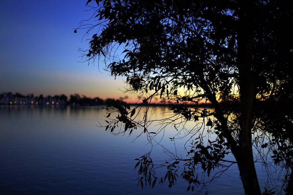 This is an image of a sunset over Lake Mission Viejo, California.