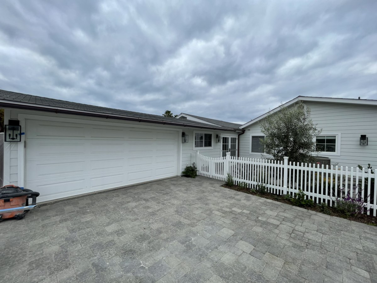 This is an image of a custom wood white garage door install located in Dana Point, CA.