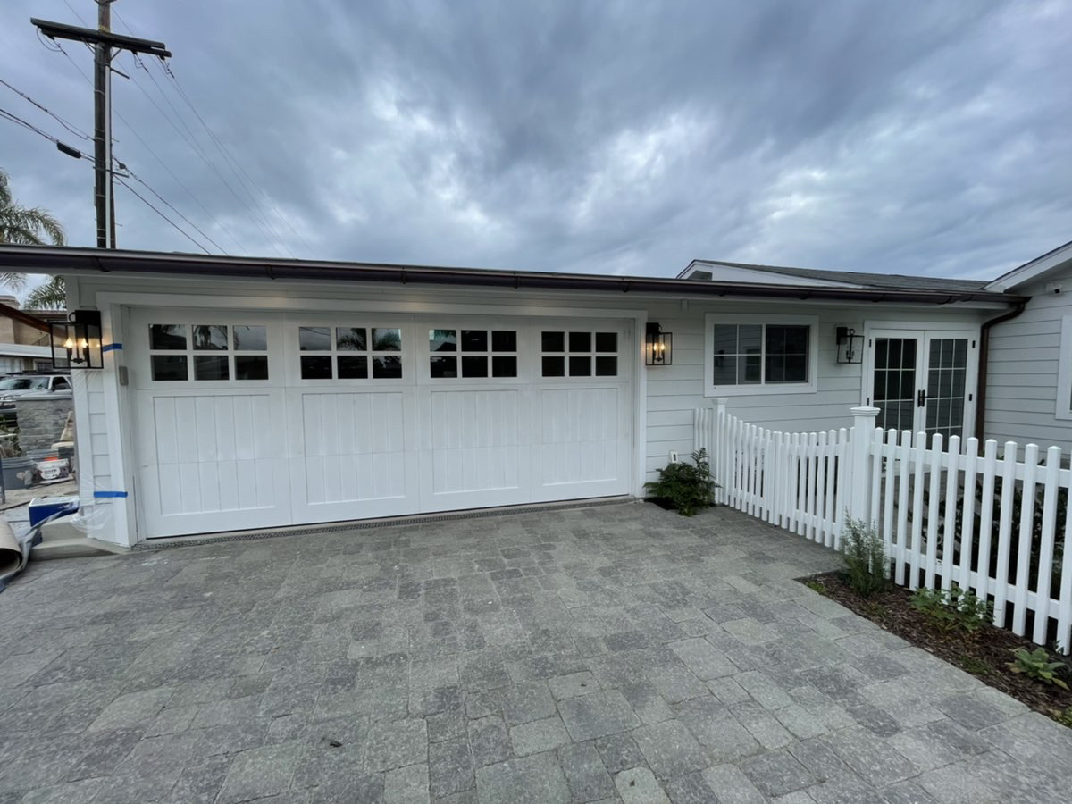 This is an image of a custom wood garage door in Dana Point.