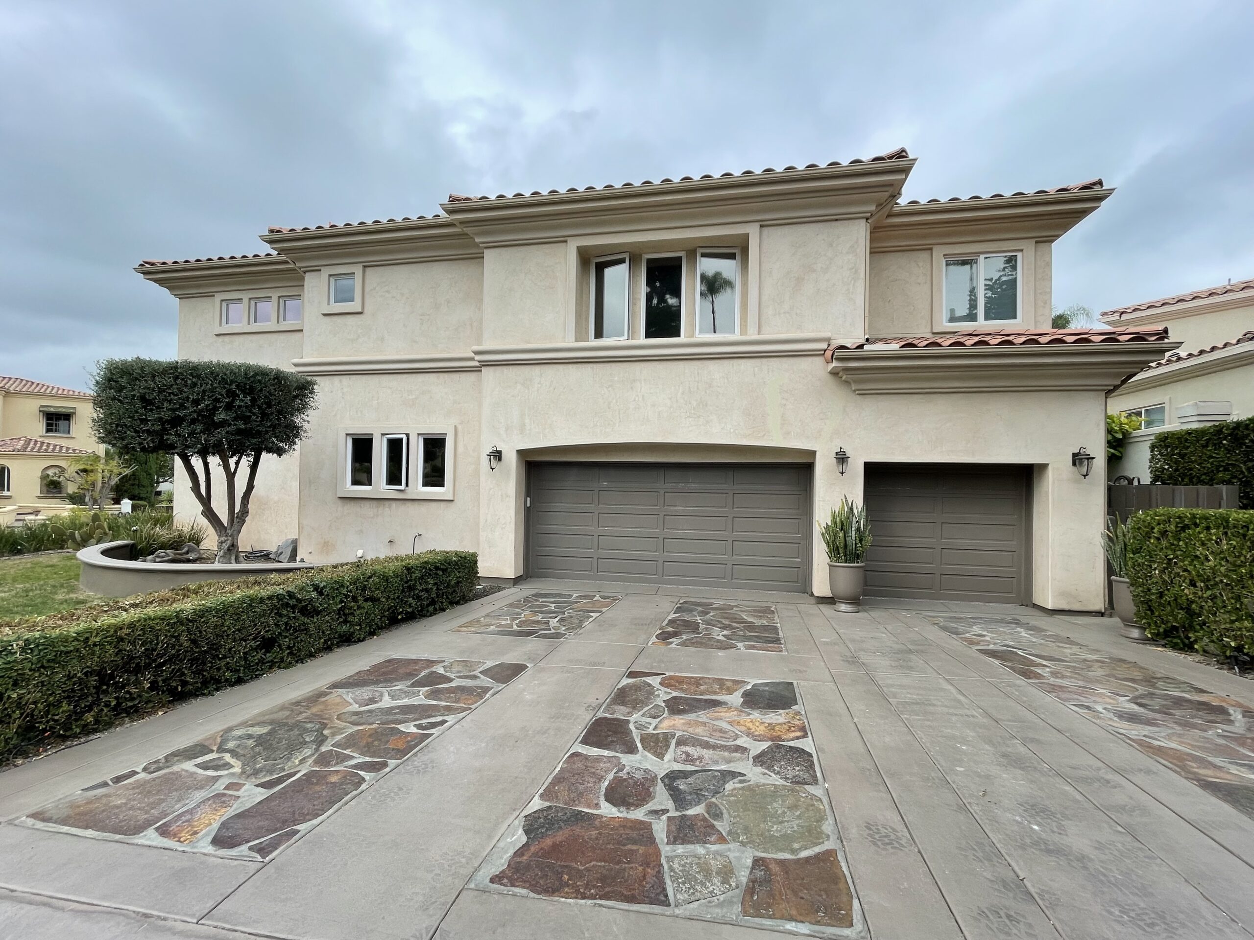 This is the before image of a new garage door project, it is a rail and stile garage door in San Juan Capistrano.
