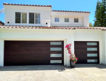 This is the after image of a new garage door project, it is a modern faux wood garage door in Laguna Niguel, California.