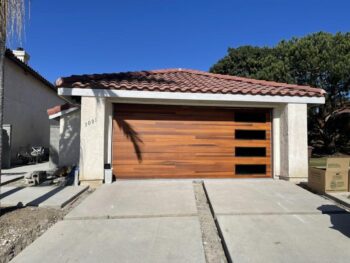 After image of faux wood cedar planks garage door in San Clemente