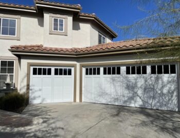This is the after image of a overlay white garage door in Rancho Santa Margarita, CA.