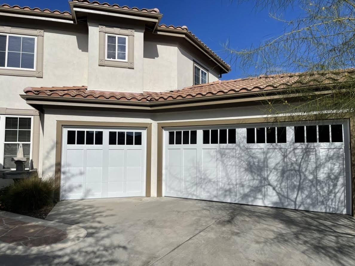 This is the after image of a overlay white garage door in Rancho Santa Margarita, CA.