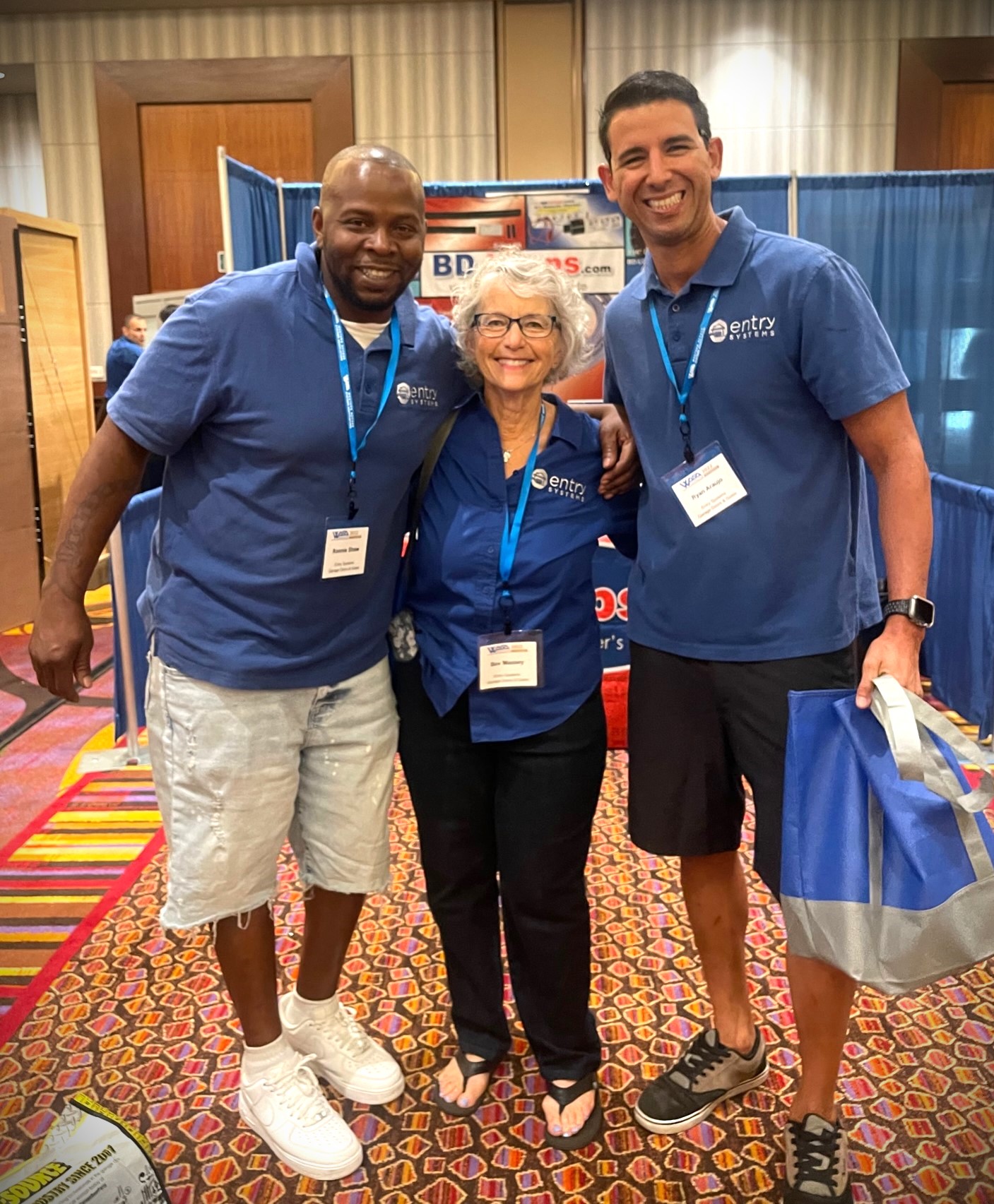 This is an image of the owner of Entry Systems and two of our garage door technicians at a trade show this year.