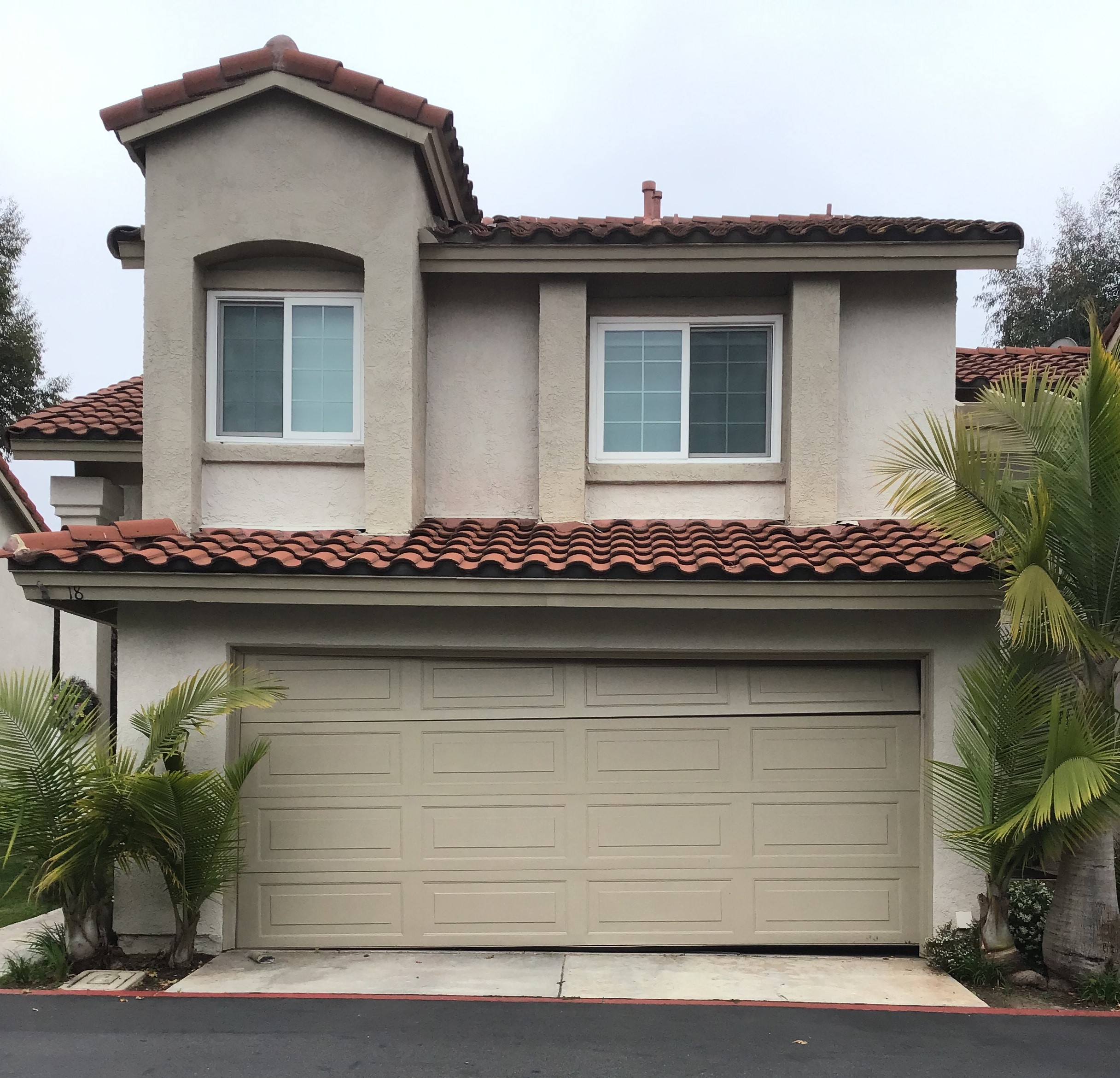 This is the before image of a garage door replacement in Rancho Santa Margarita, CA.