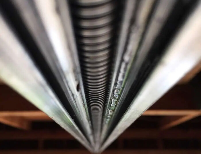 This is an image of a screw drive garage door opener rail.