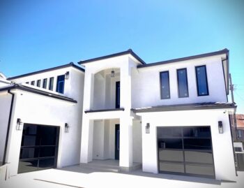 After image of new glass black garage door installation in Dana Point.