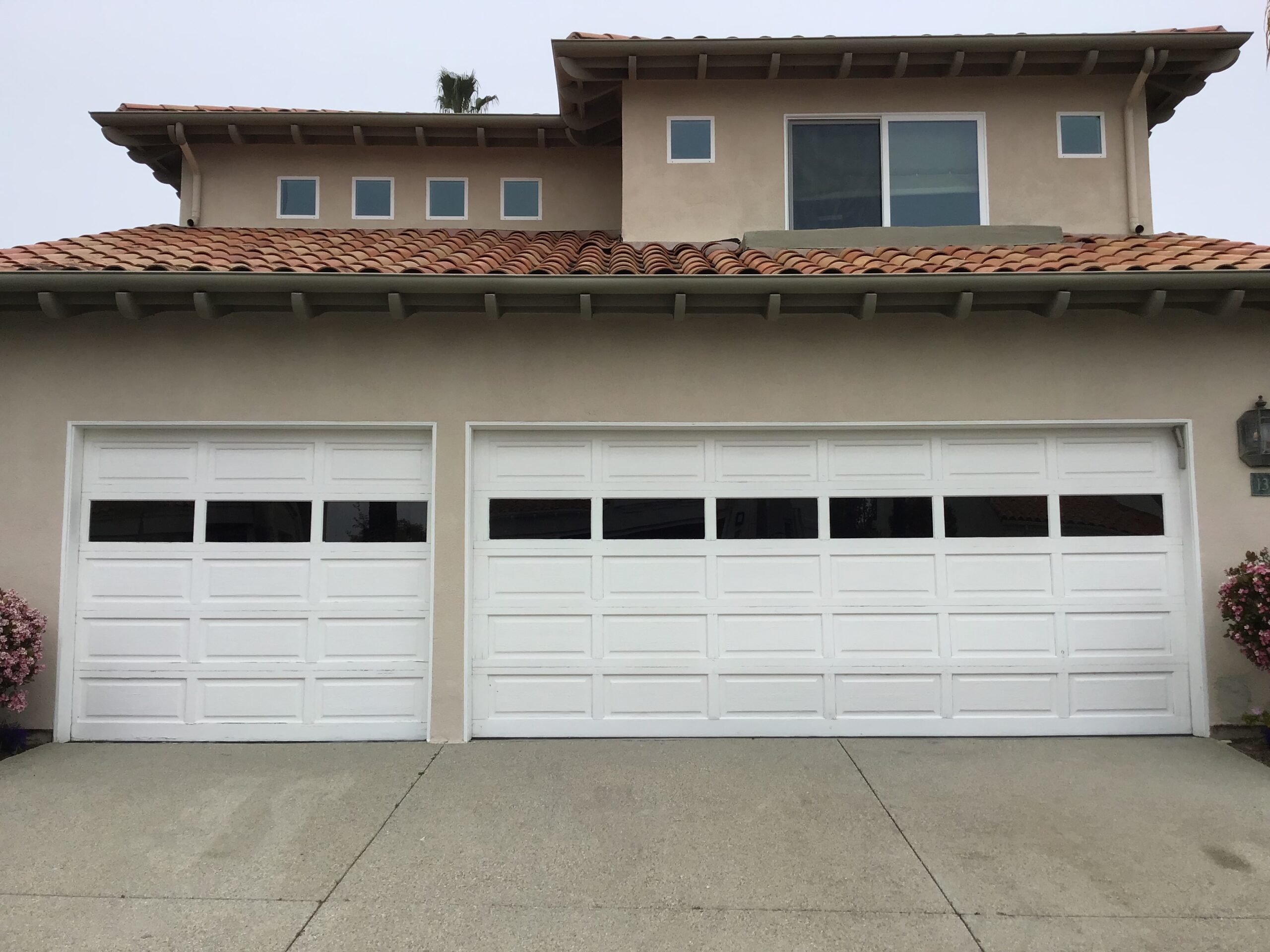 White long panel steel garage door install before pic in Laguna Niguel CA.