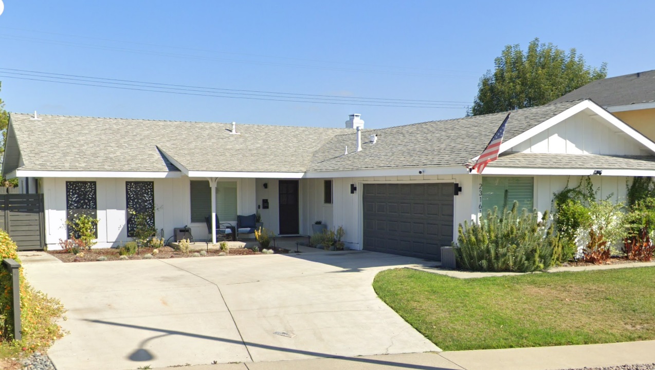 Before picture of Lake Forest garage door install with short panel grey