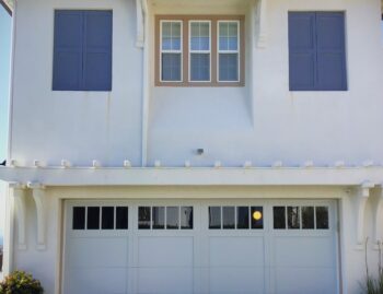 carriage farmhouse style garage door with windows white