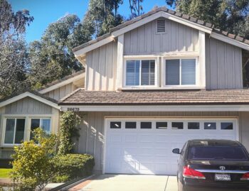 white short panel with windows garage door install in mission viejo
