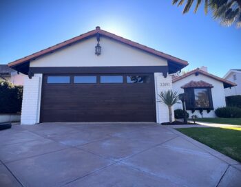 faux wood planks garage door remodel in Dana Point