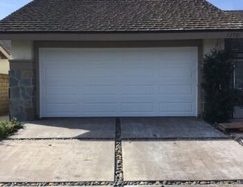 white long panel garage door installation in Dana Point