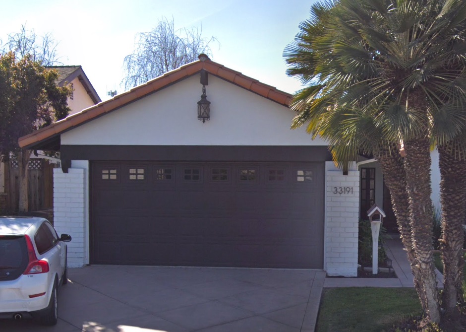 brown raised panel garage door in Dana Point