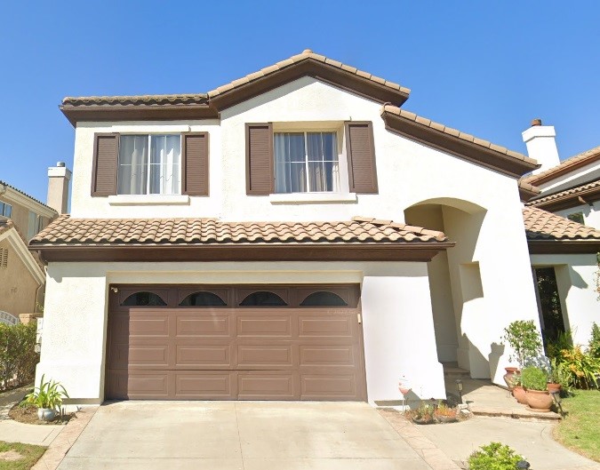 traditional raised panel brown garage door mission viejo before