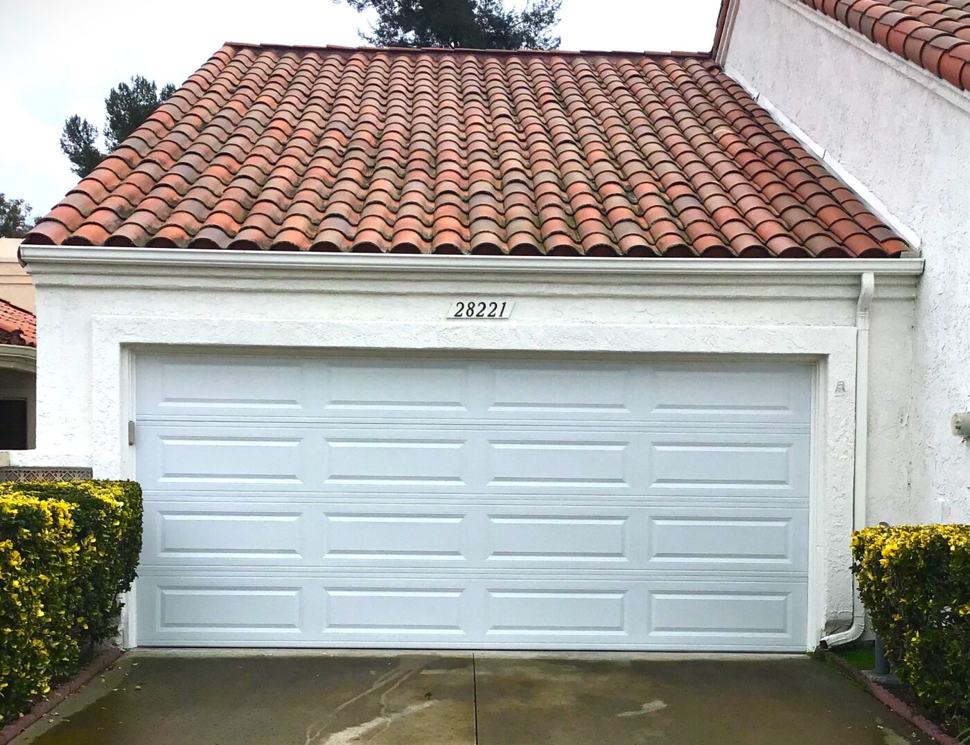 white long panel garage door newly replaced in newport beach