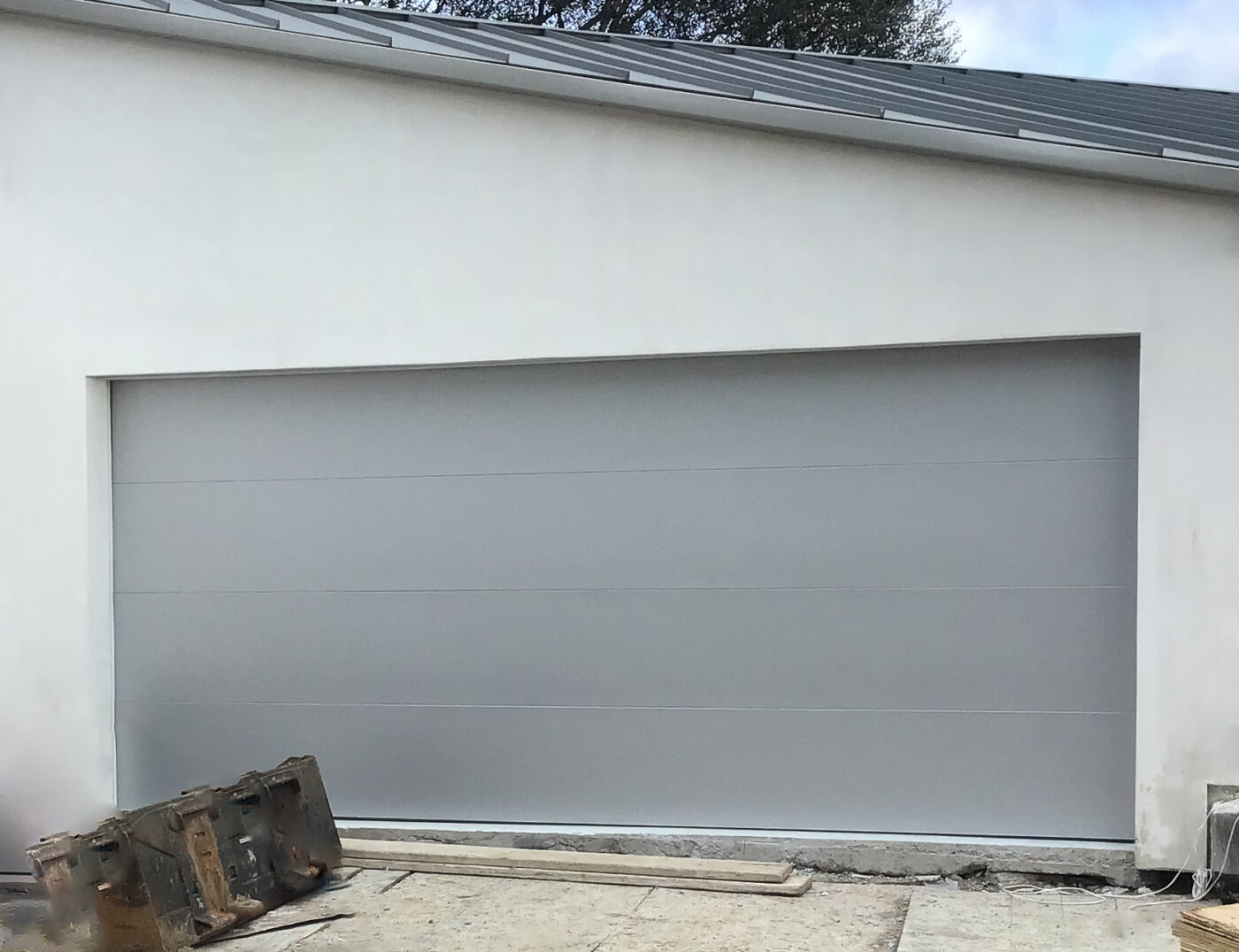 silver modern flush steel garage door in laguna beach ca