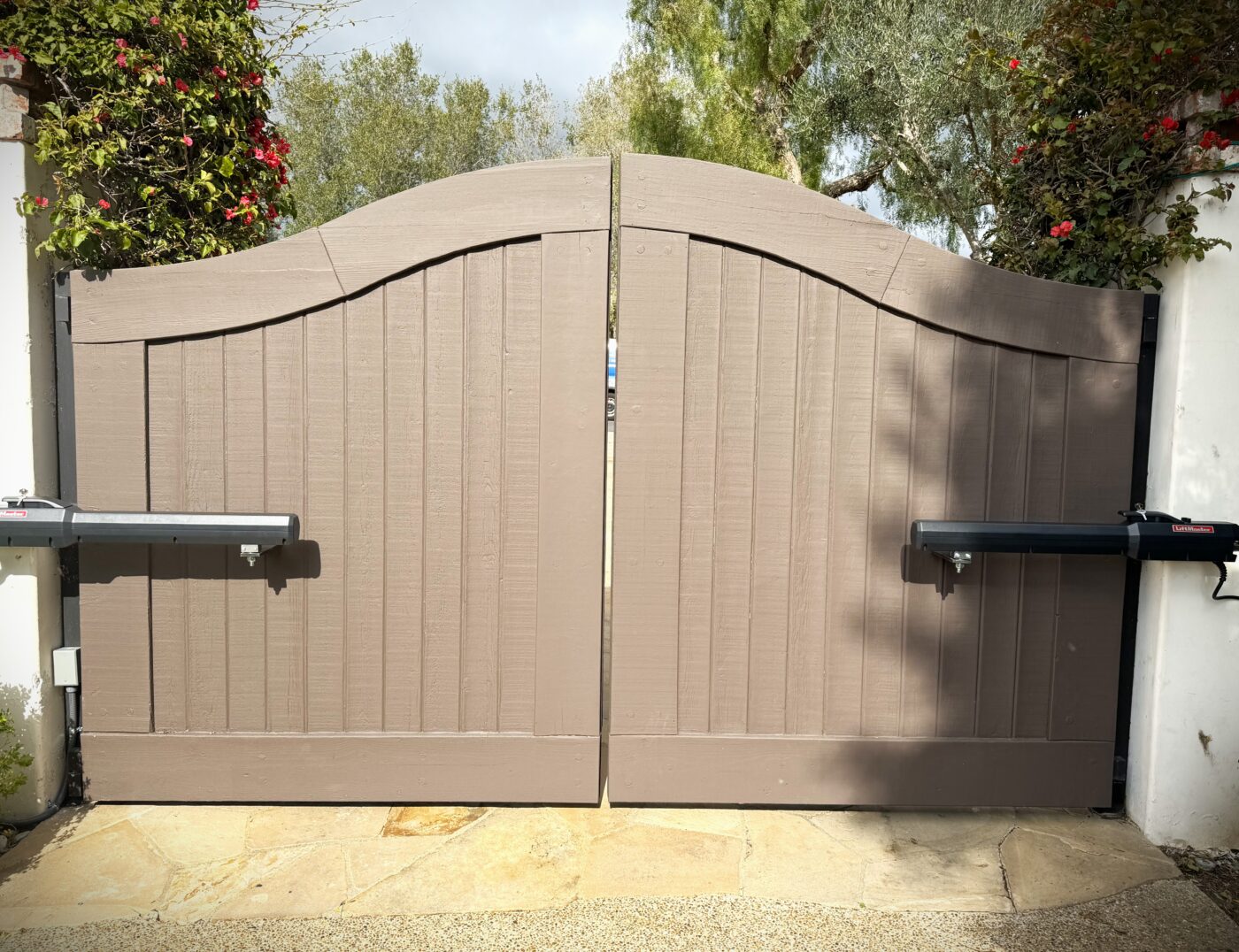 Wooden driveway automated gate in Irvine, CA