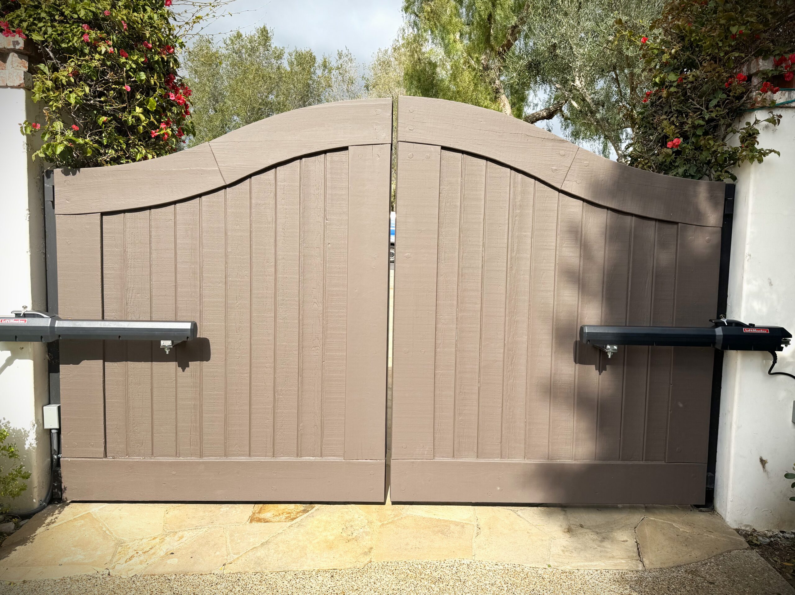 Wooden driveway automated gate in Irvine, CA