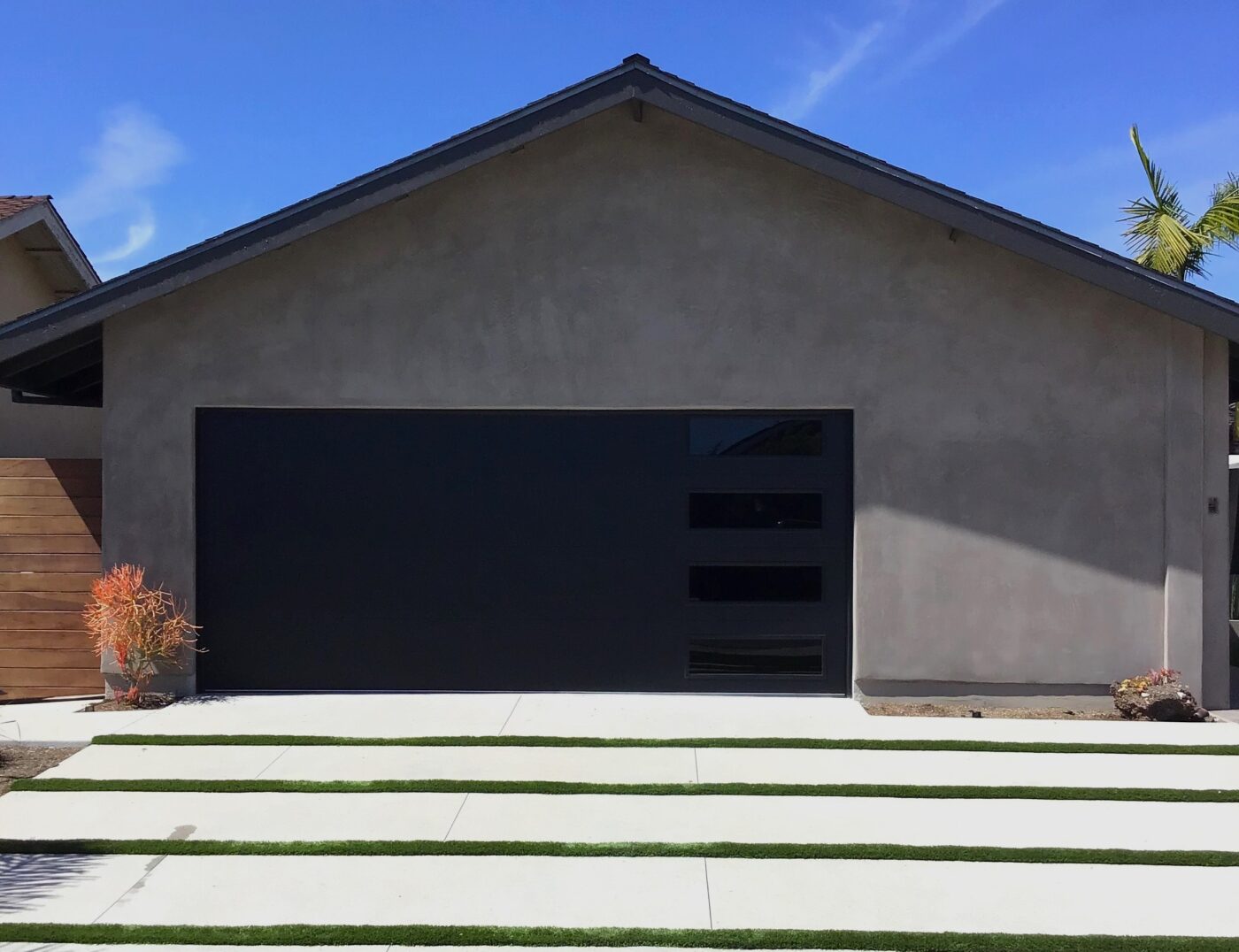 Black skyline flush modern garage door in Mission Viejo, CA after image