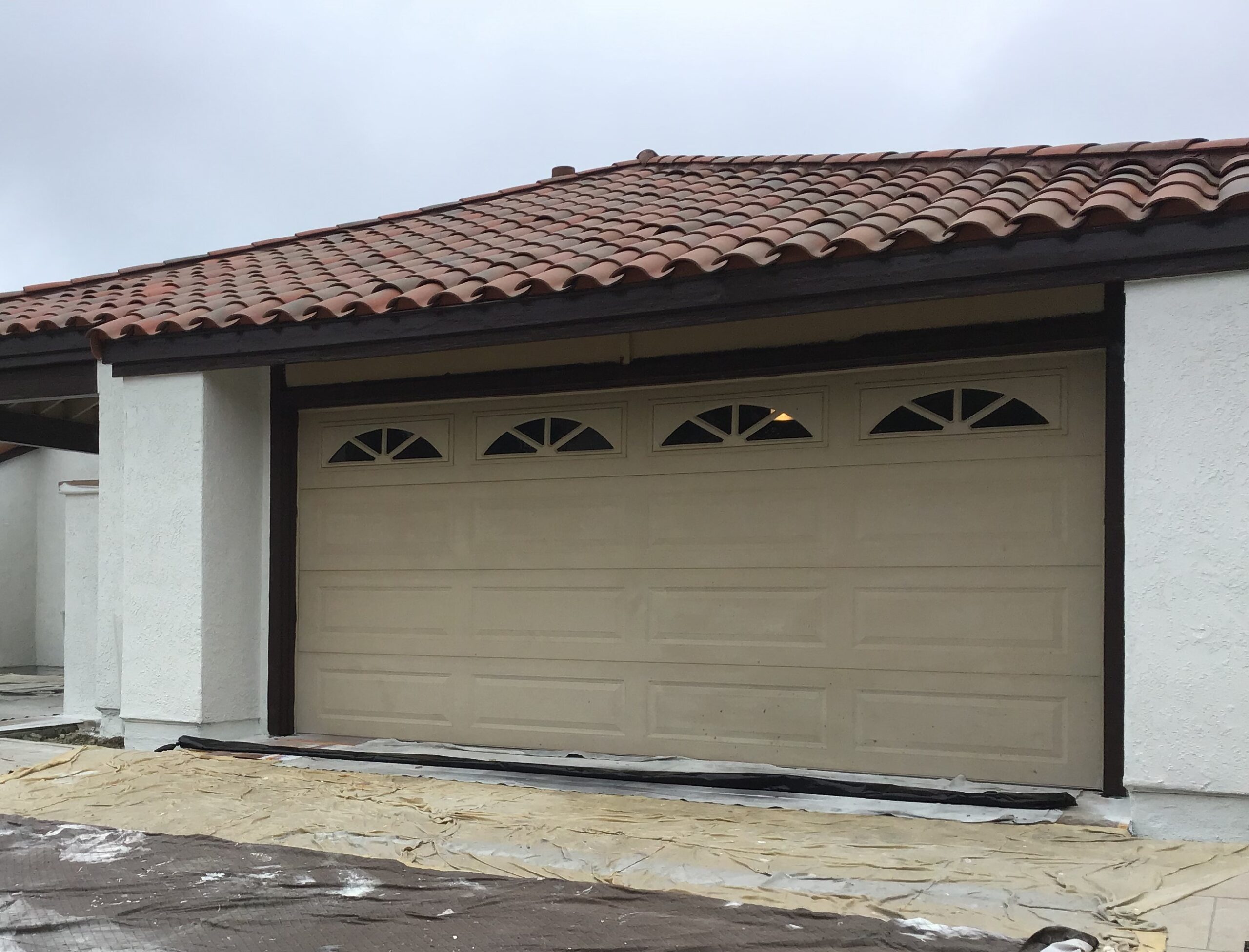 Before image of light brown long panel garage door in Mission Viejo, CA