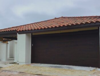 Walnut faux wood steel garage door after image in Mission Viejo, CA