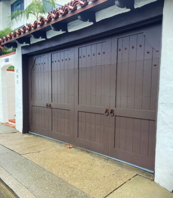 spanish style brown wood overlay garage door san Clemente after retrofit