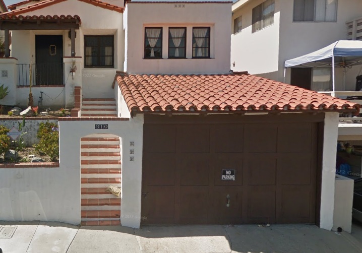brown one piece garage door in San Clemente before retrofit