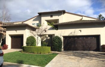 replacement faux walnut wood garage door in laguna niguel