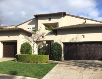replacement faux walnut wood garage door in laguna niguel