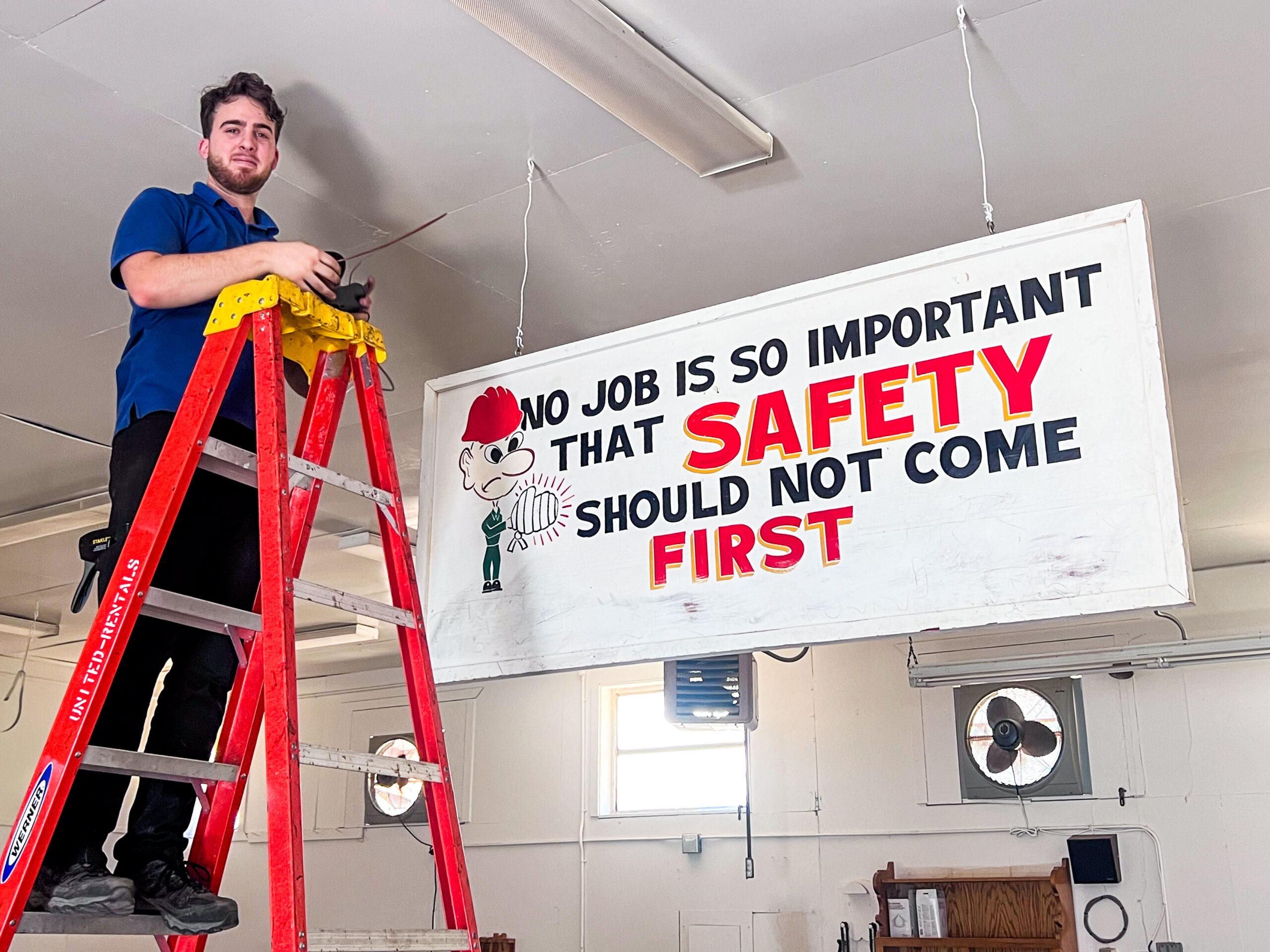 garage door technician safety first sign