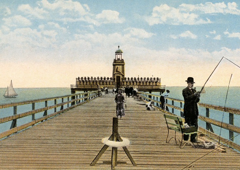 man in 1920s fishing of seal beach, ca pier