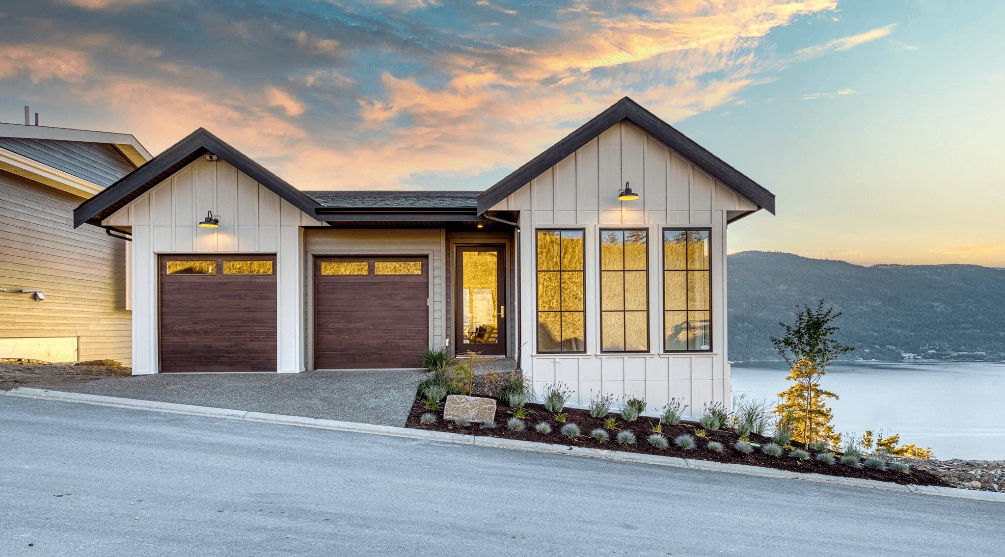 mahogany garage door with windows during sunset