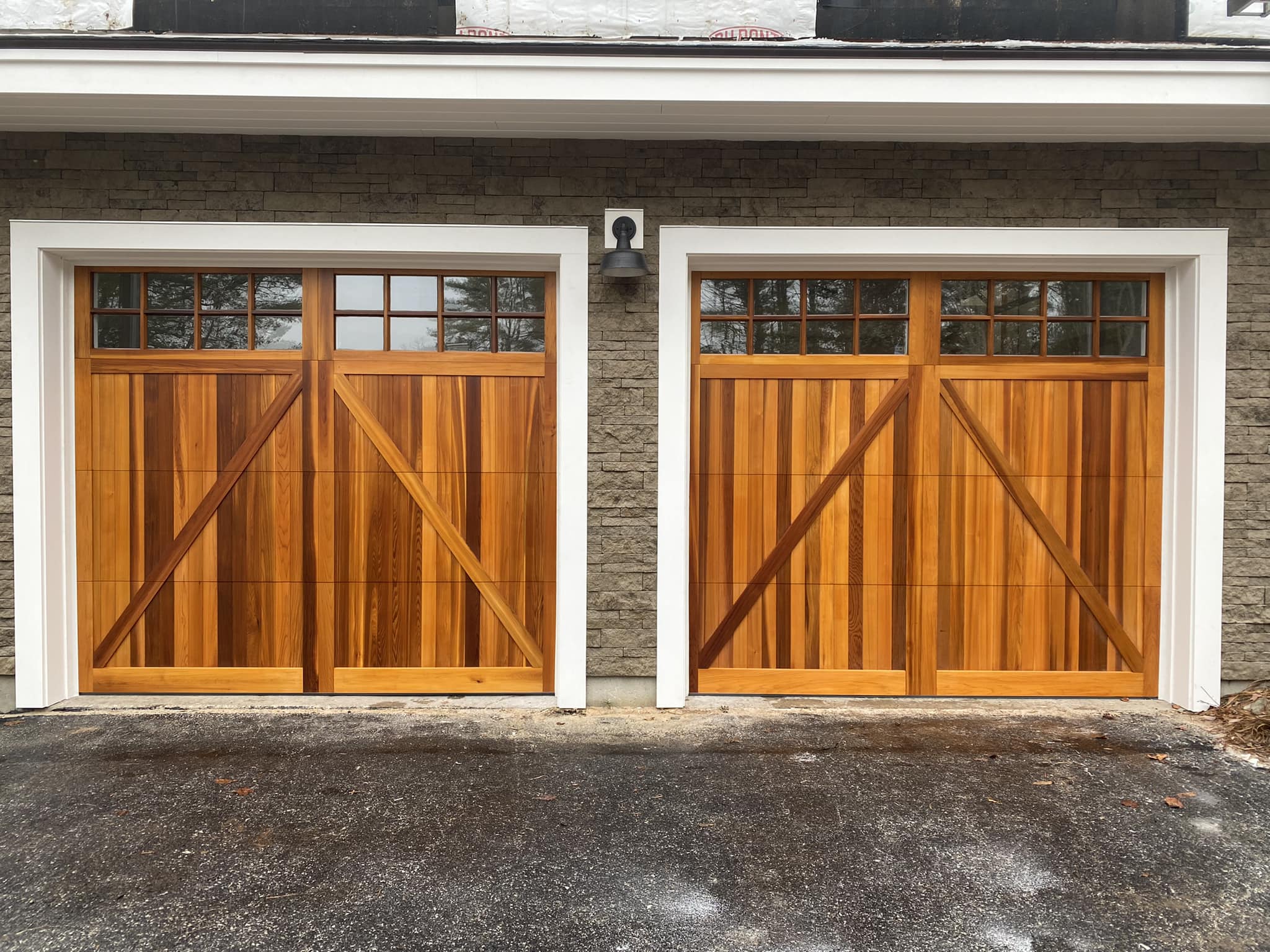 cedar faux wood garage door with modern farmhouse design