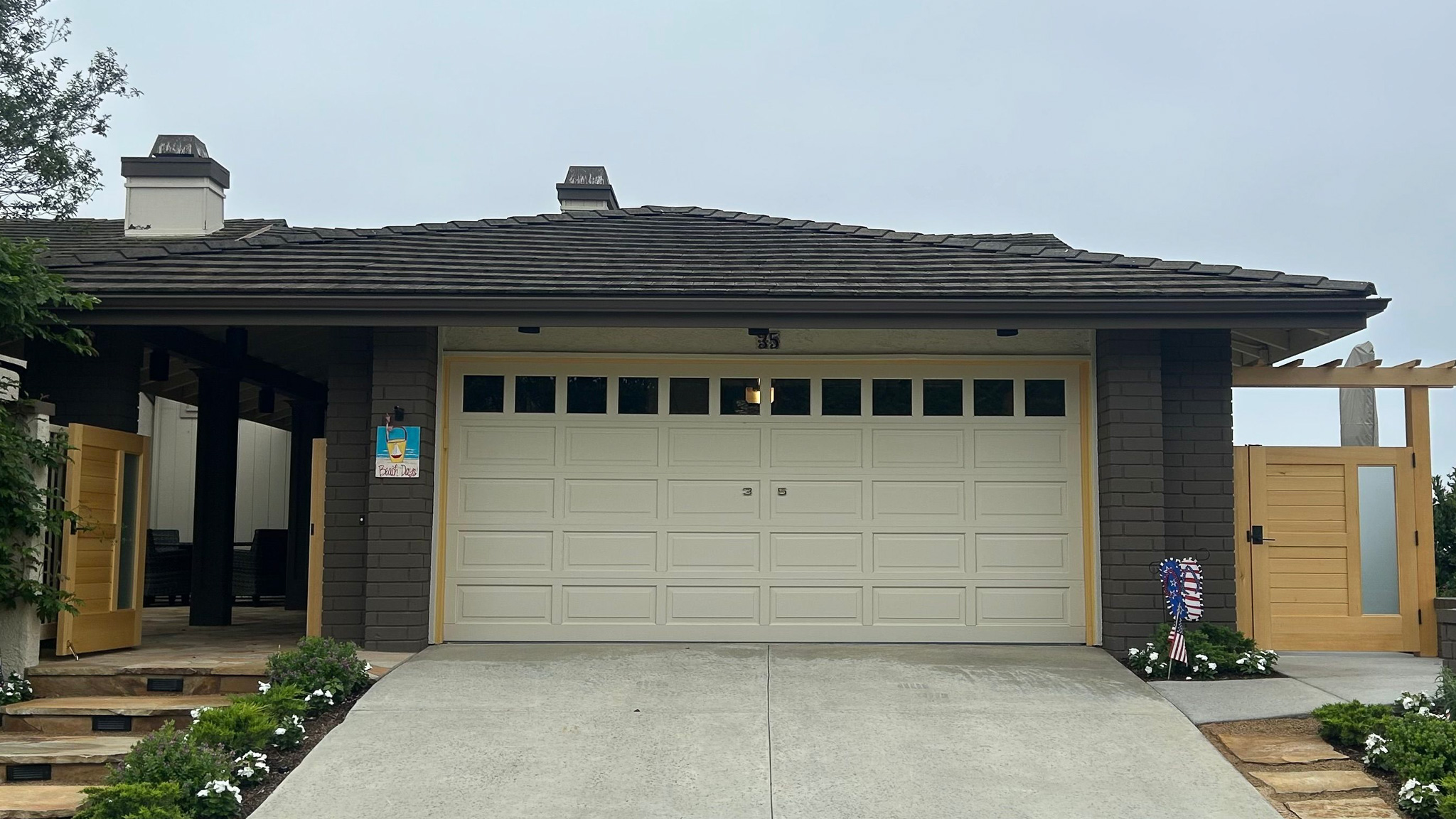 Original rail and stile wood long panel garage door