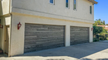 new garage door installation with faux driftwood color