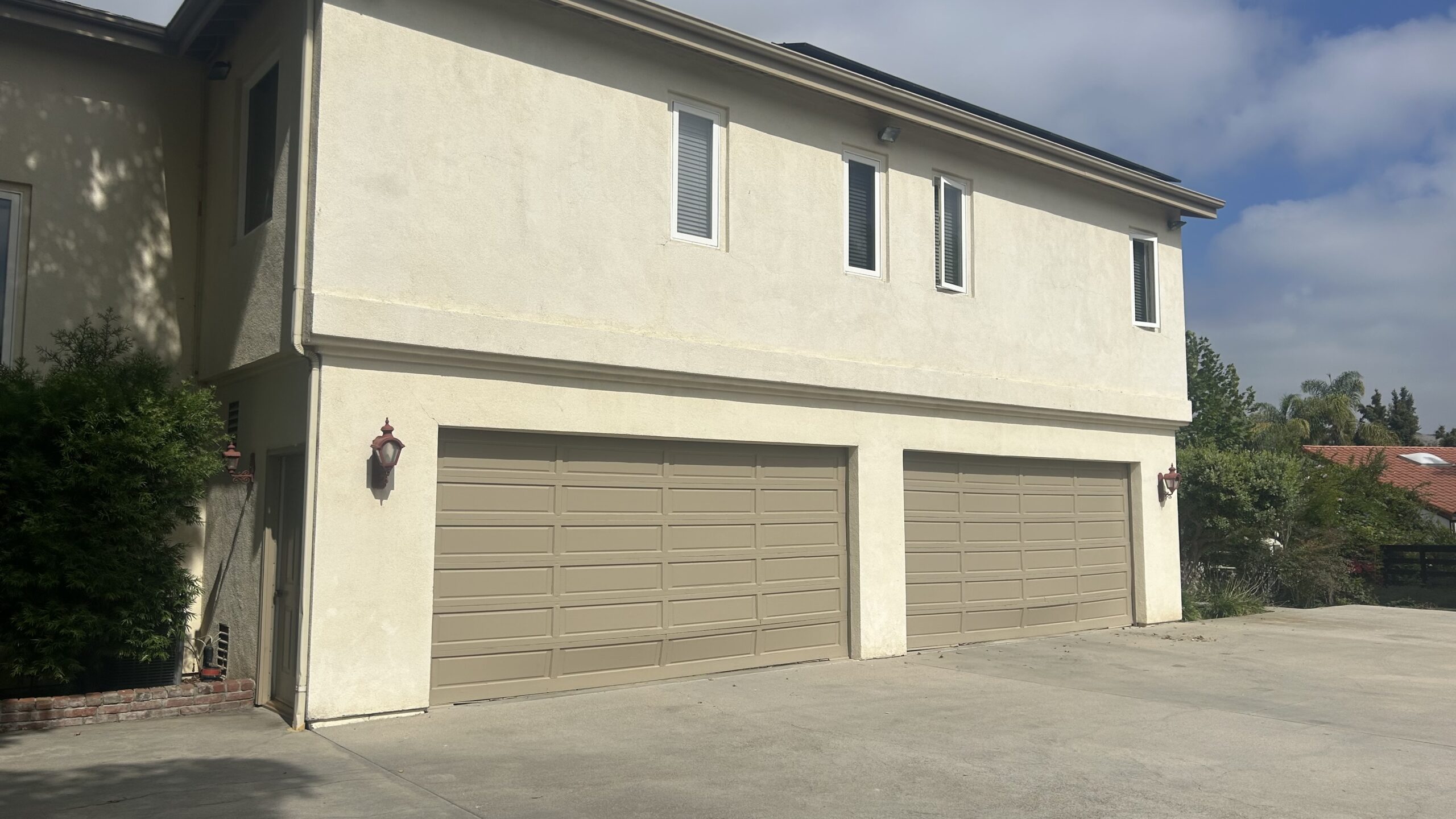 before garage door redo- original wood garage doors