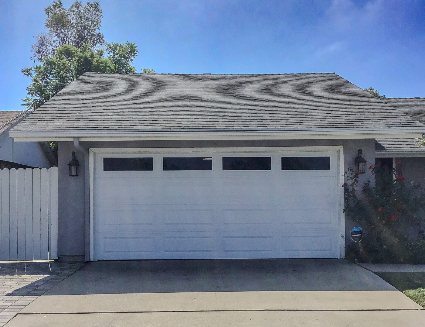 after retrofit. white long panel with tinted windows