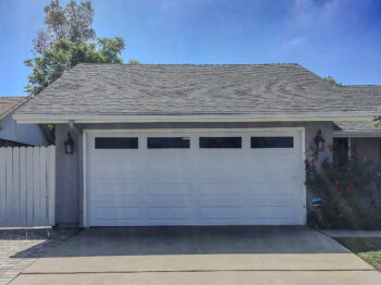 after retrofit. white long panel with tinted windows