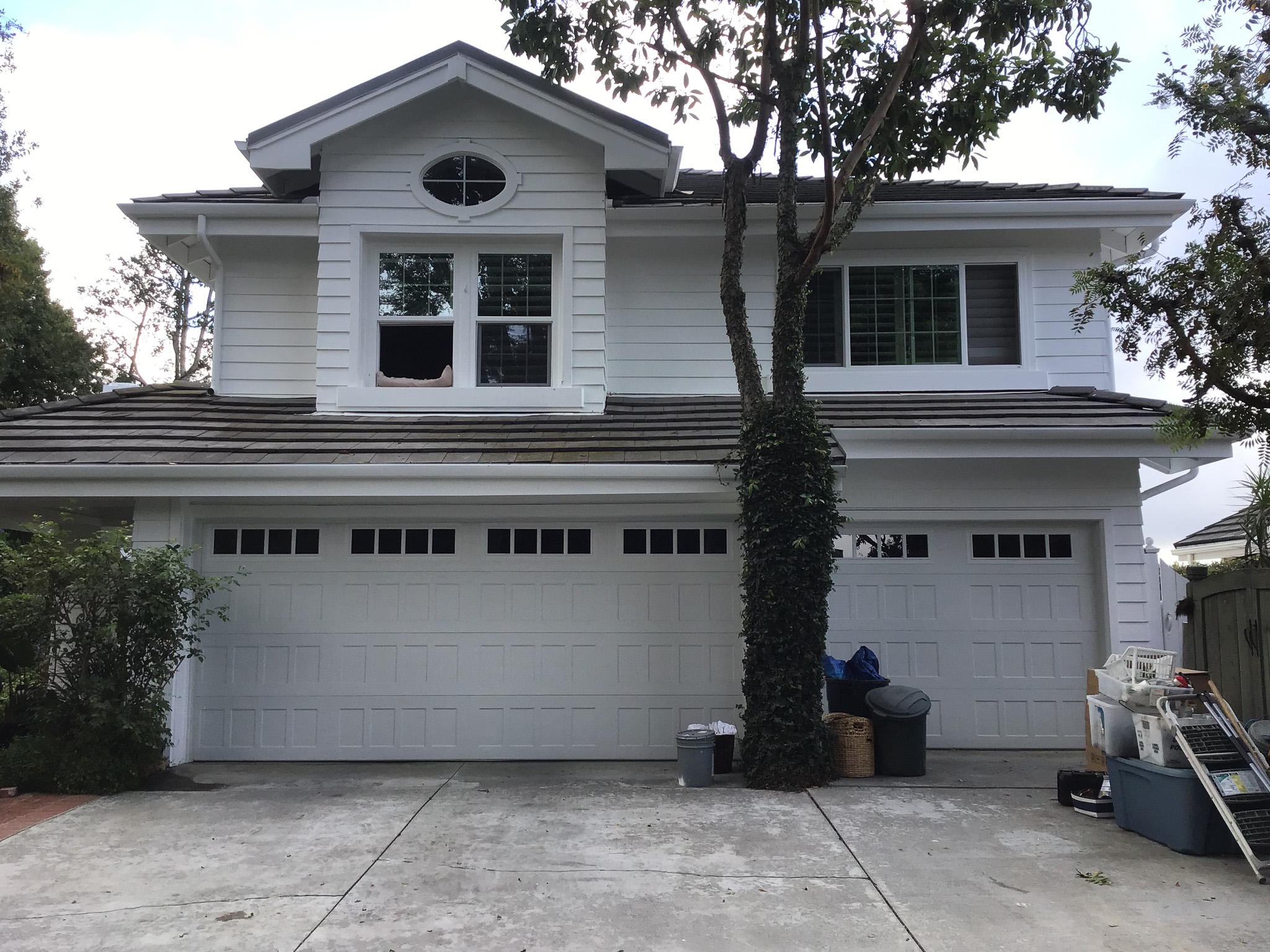 Stamped shaker garage door with madison windows