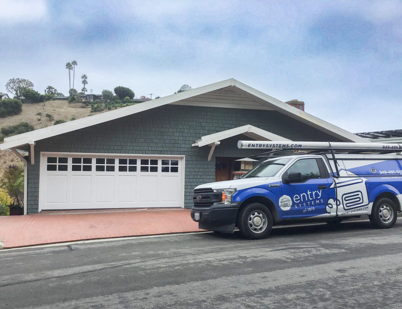 custom wood paint grade white garage door with windows