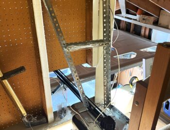 image of a garage door opener with a hole cut so it can be inside an attic