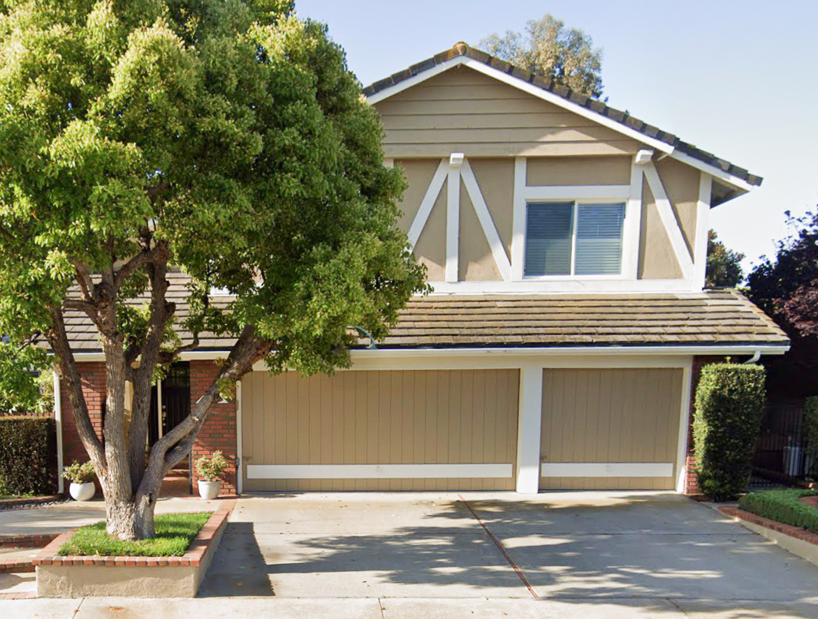 one piece yellow wood garage door