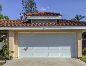 white traditional white raised panel garage door