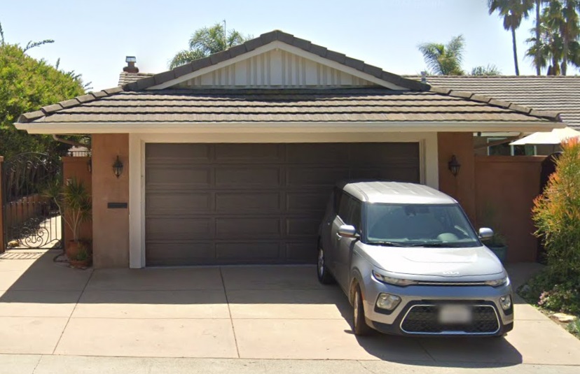 traditional brown garage door before upgrade