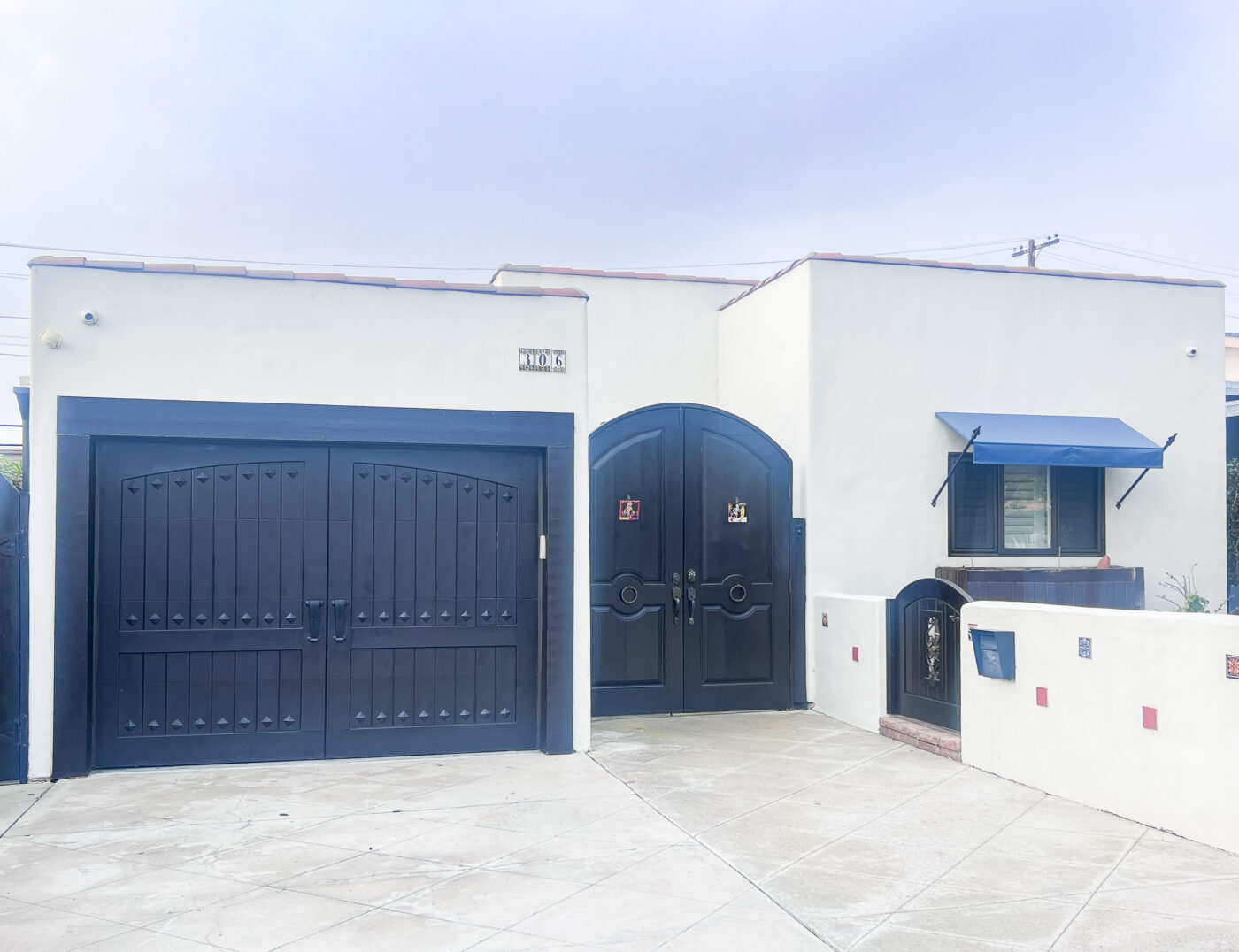 alder custom wood garage door in san clemente spanish style